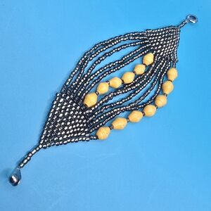 Teng Yue Beaded Bracelet with Yellow and Silver Accents 7 Inch  Total Length